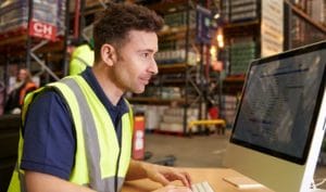 warehouse worker man at desk image