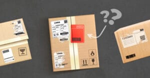 Three packages on a gray background display various shipping labels and freight paperwork. The central package has a "Fragile" sticker with a question mark doodle above it, suggesting confusion. Small icons indicating "this side up" and "fragile" are also present on the box.